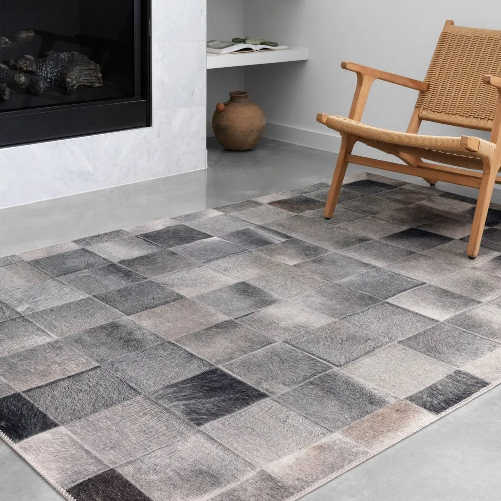 Alexander Home Davide Faux Cowhide Area Rug
