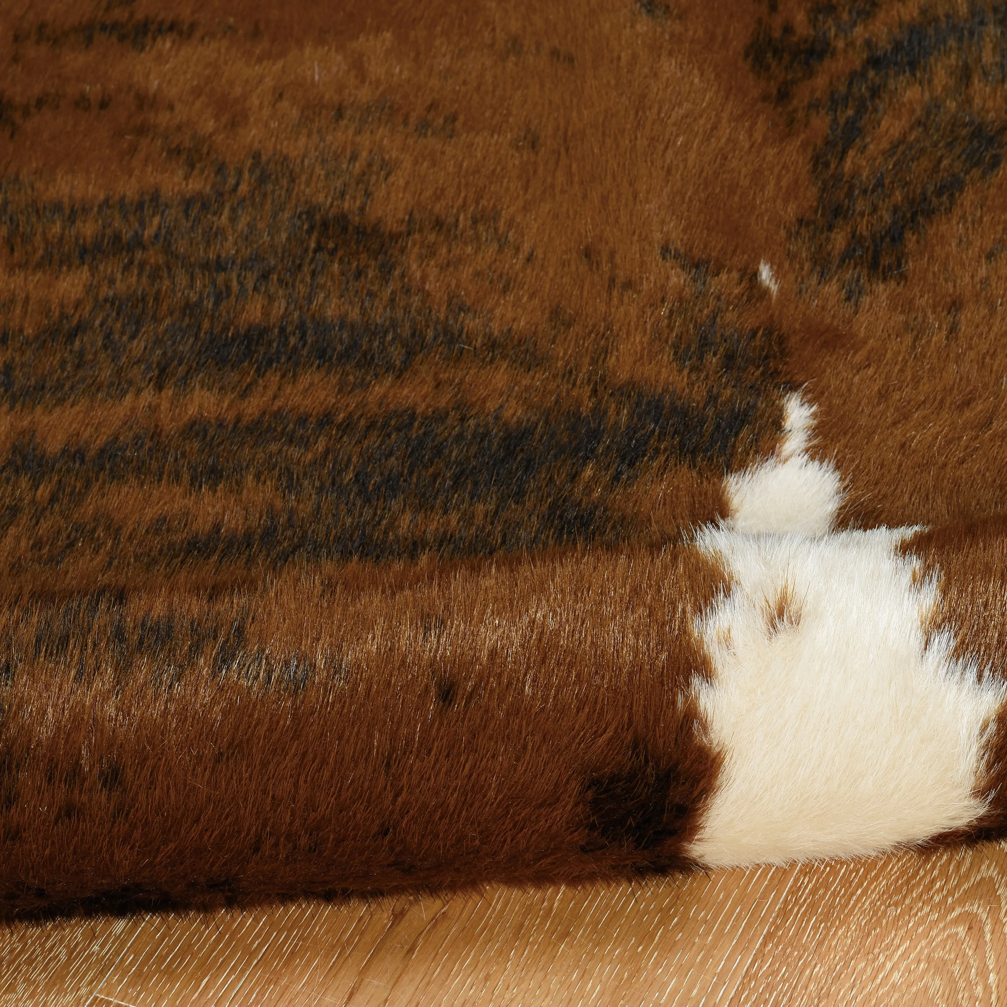 Faux Cowhide Area Rug - 5' x 6'6