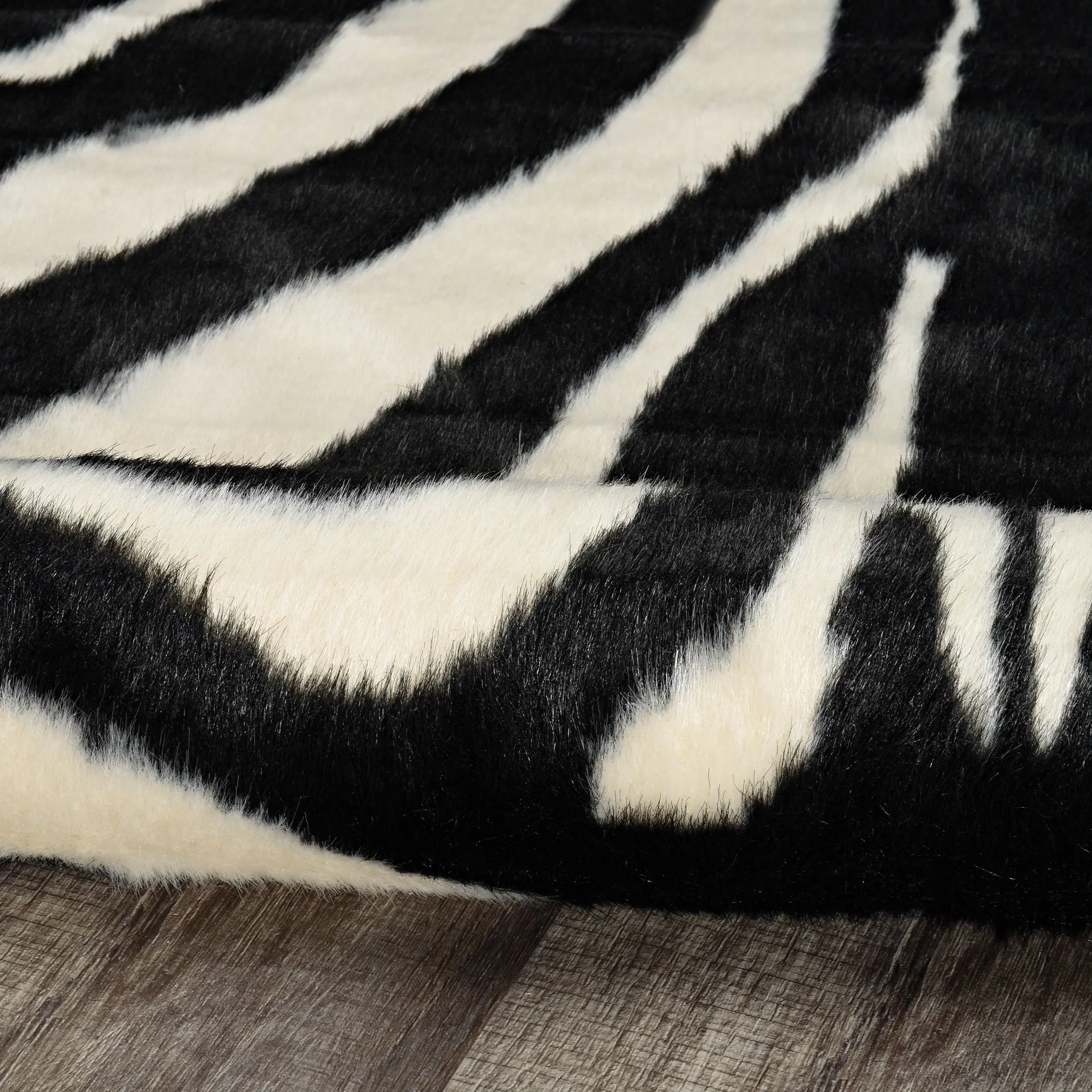 Faux Cowhide Area Rug - 5' x 6'6