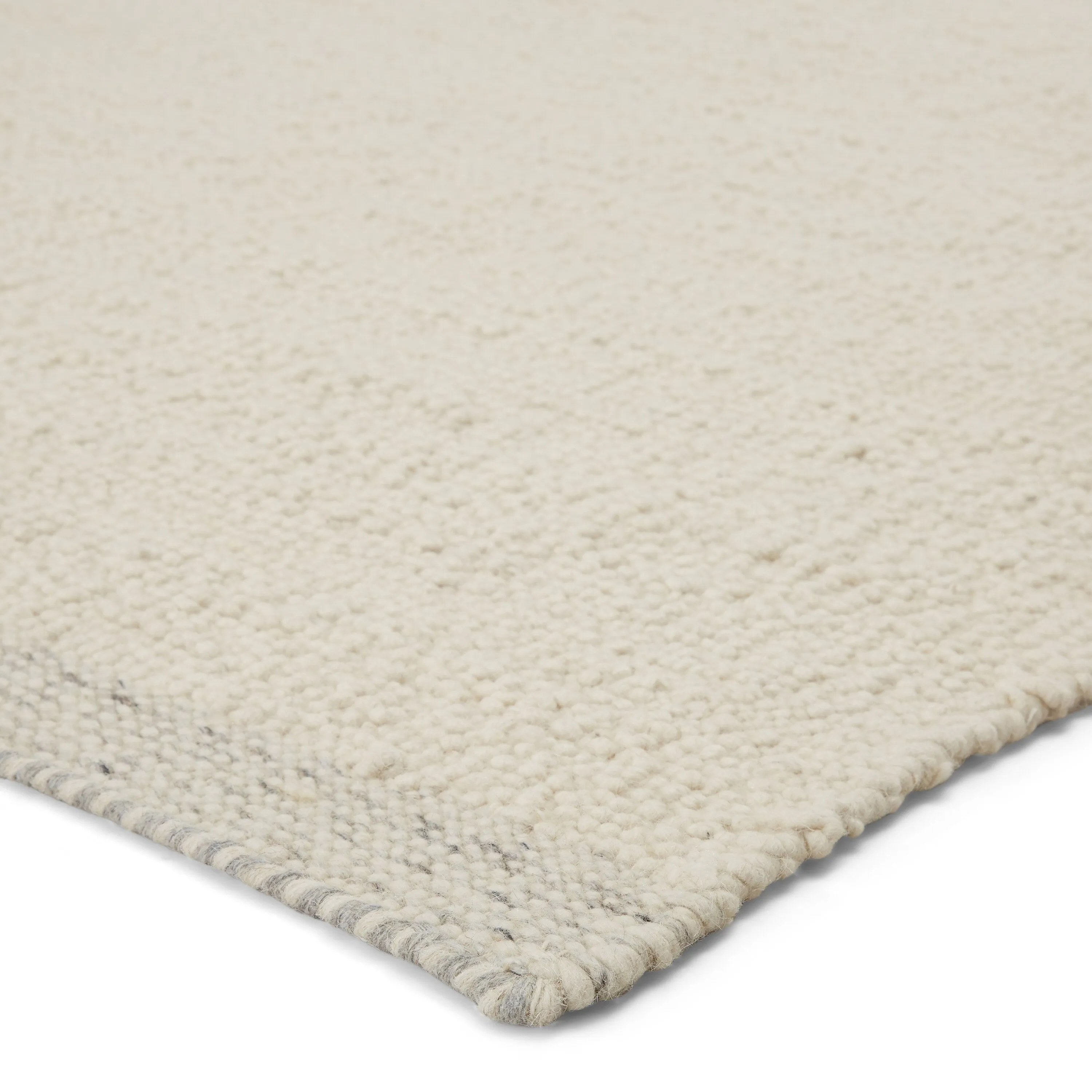 Jayda Handmade Solid Cream/ Light Gray Area Rug