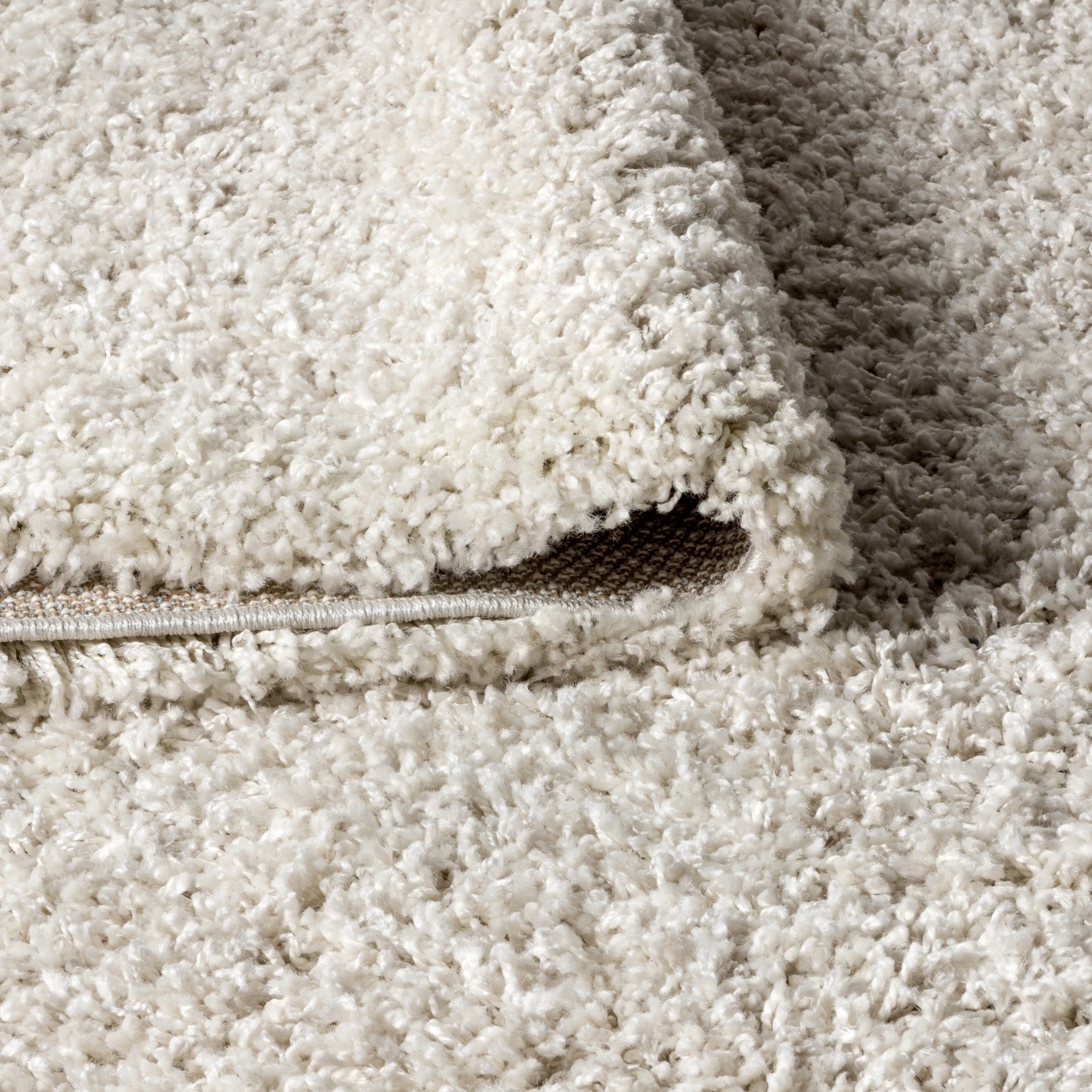JONATHAN Y Modern Shag Plush Tassel Area Rug