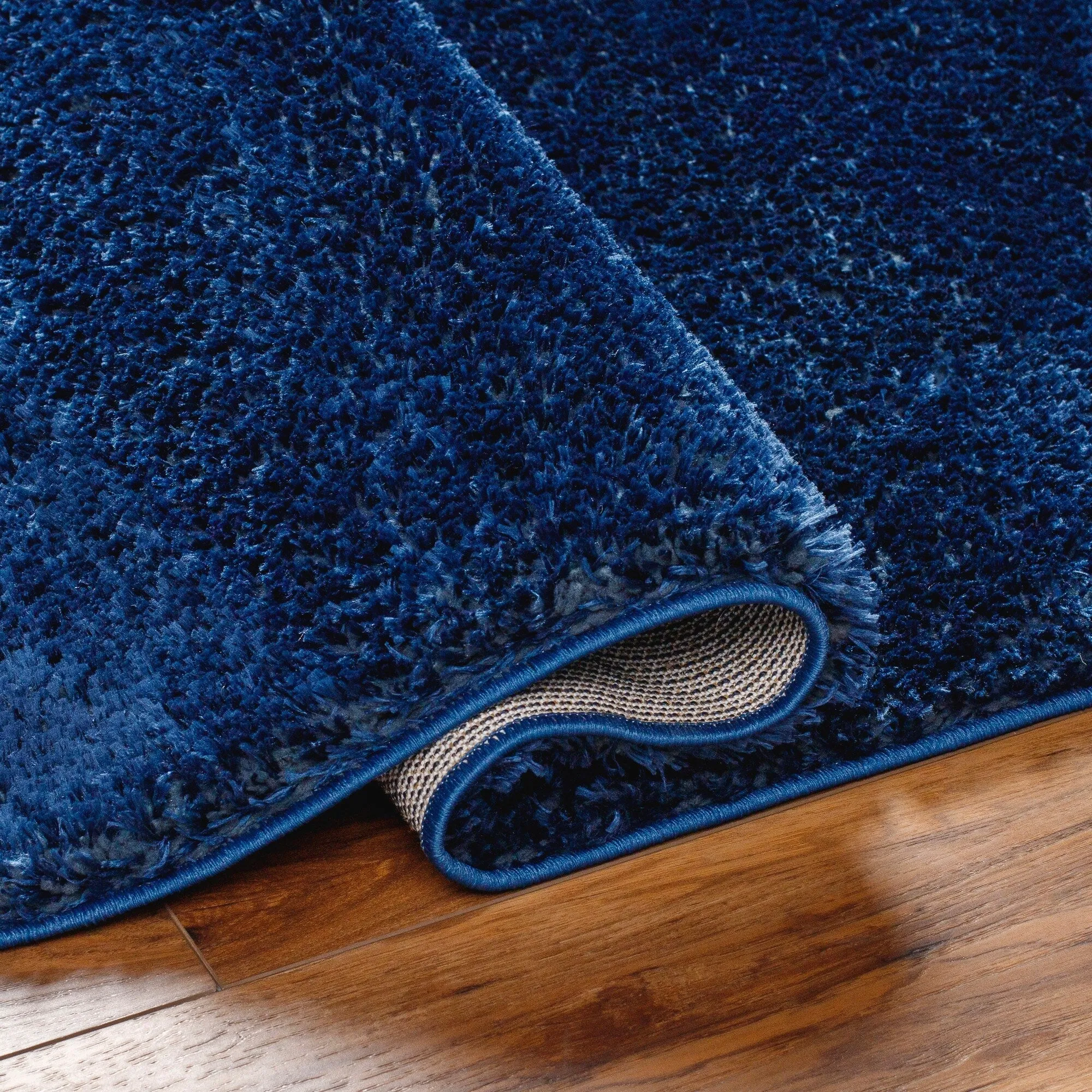 Livabliss Cloudy Vibrant Solid Plush Area Rug