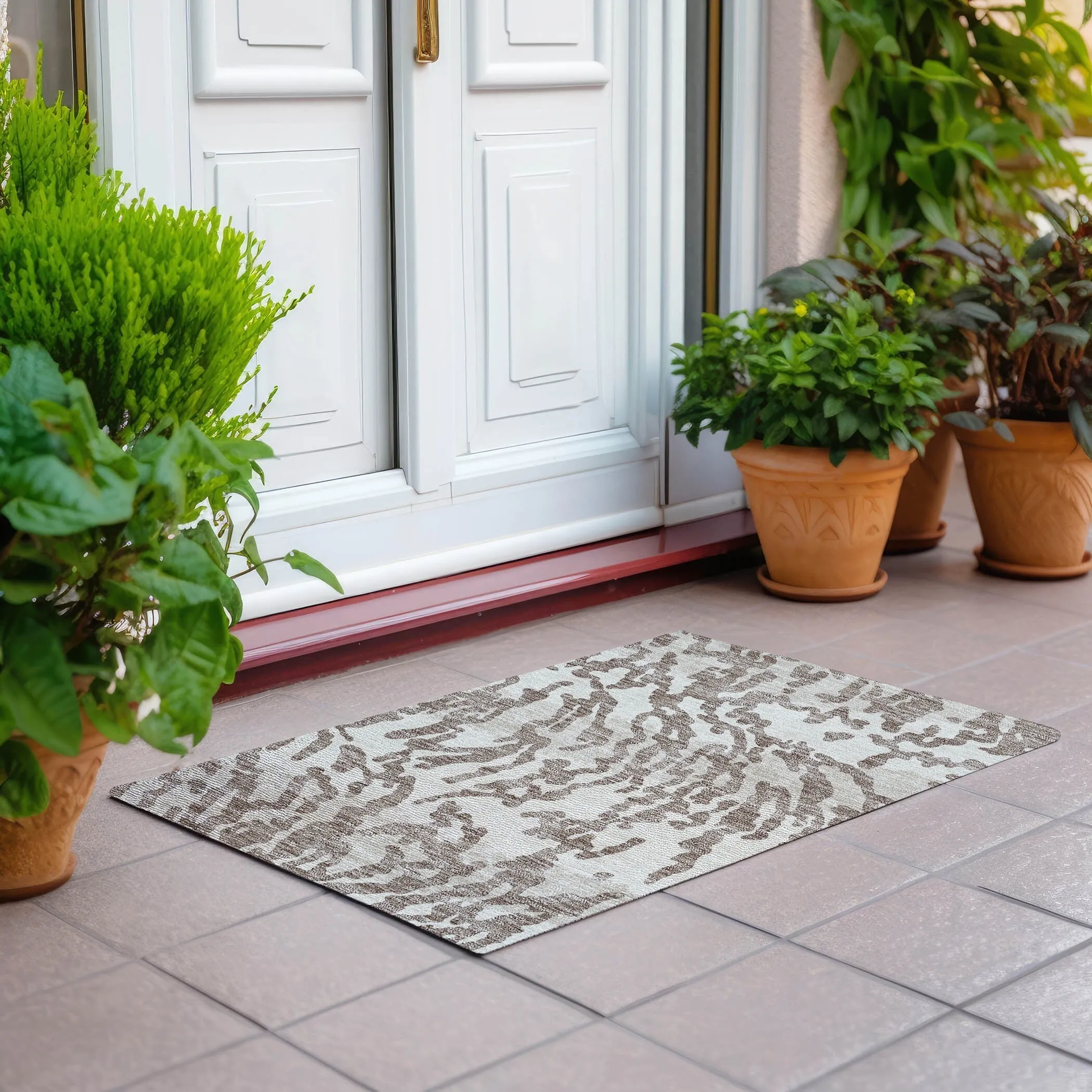 Machine Washable Indoor/ Outdoor Chantille Animal Print Abstract Rug