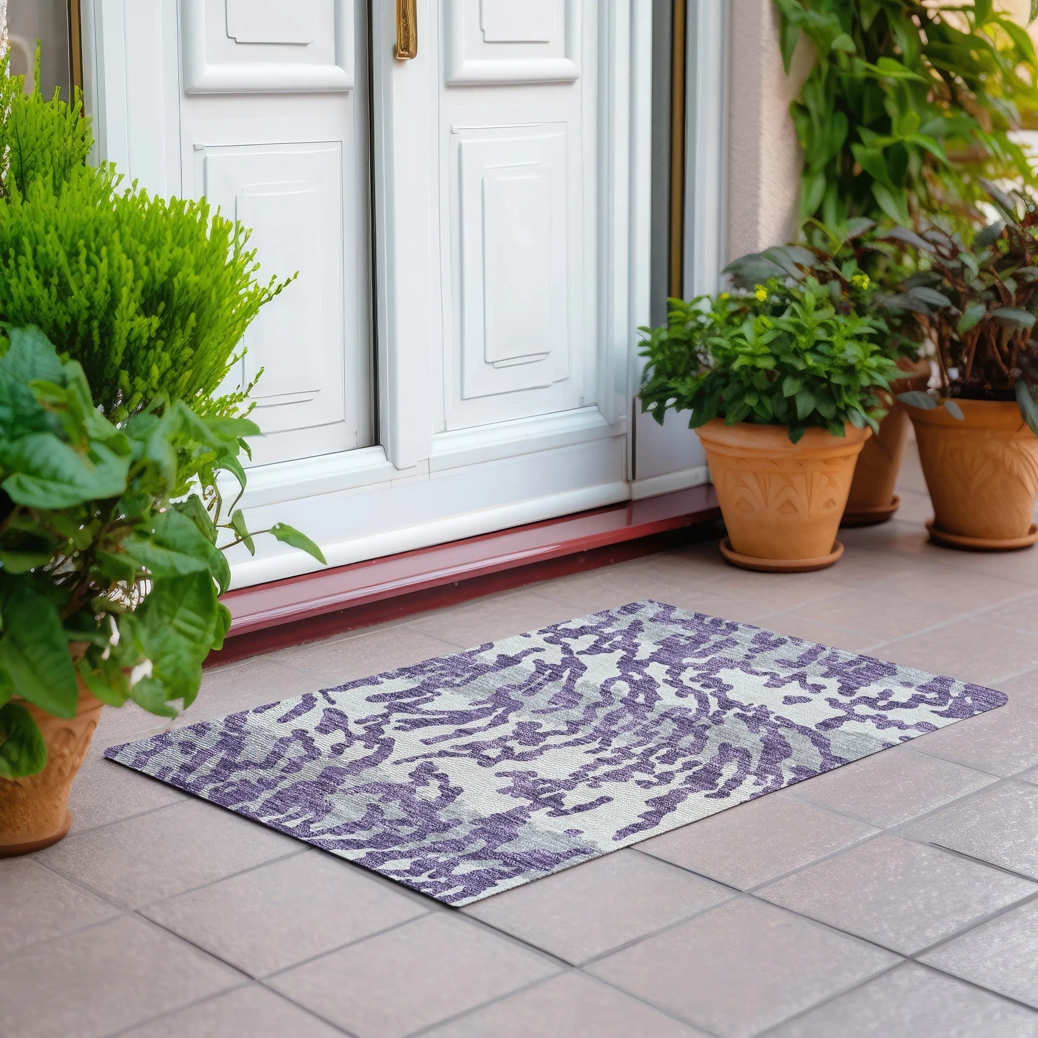 Machine Washable Indoor/ Outdoor Chantille Animal Print Abstract Rug