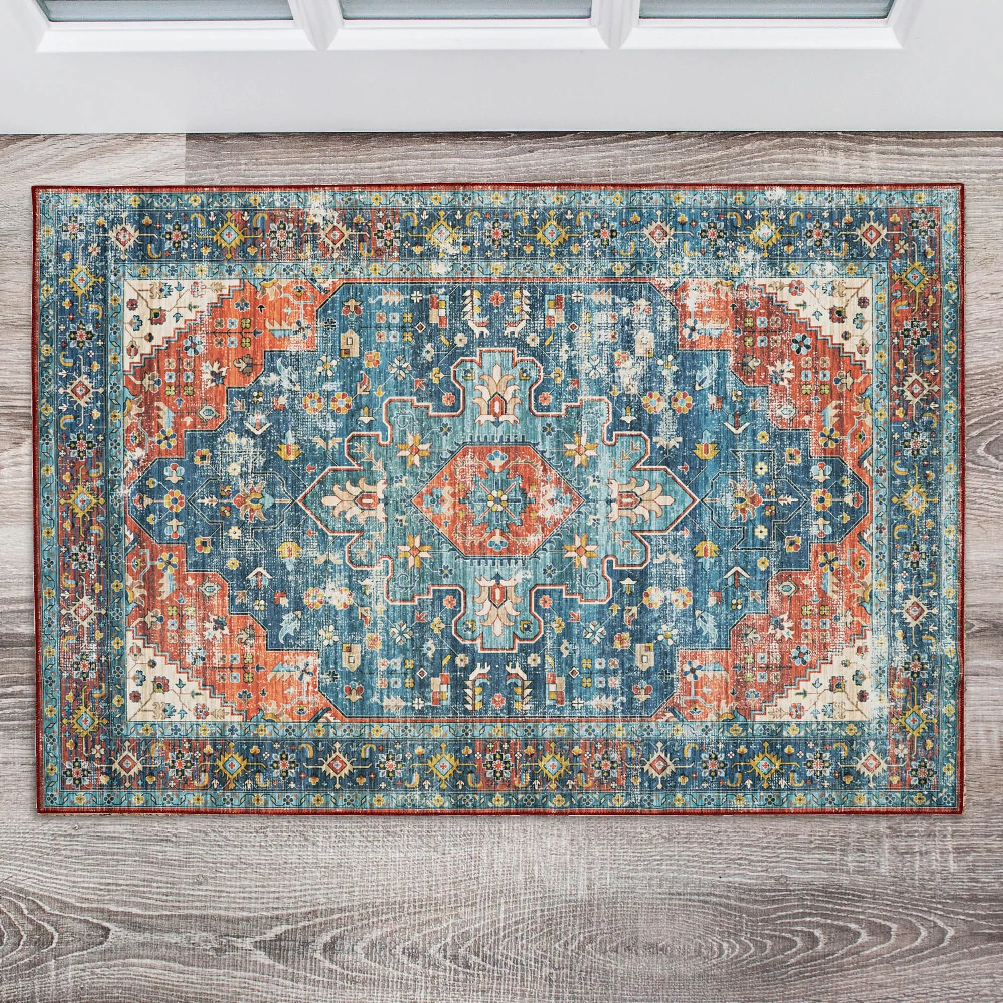 Markum Machine Washable Teal and Rust Area Rug