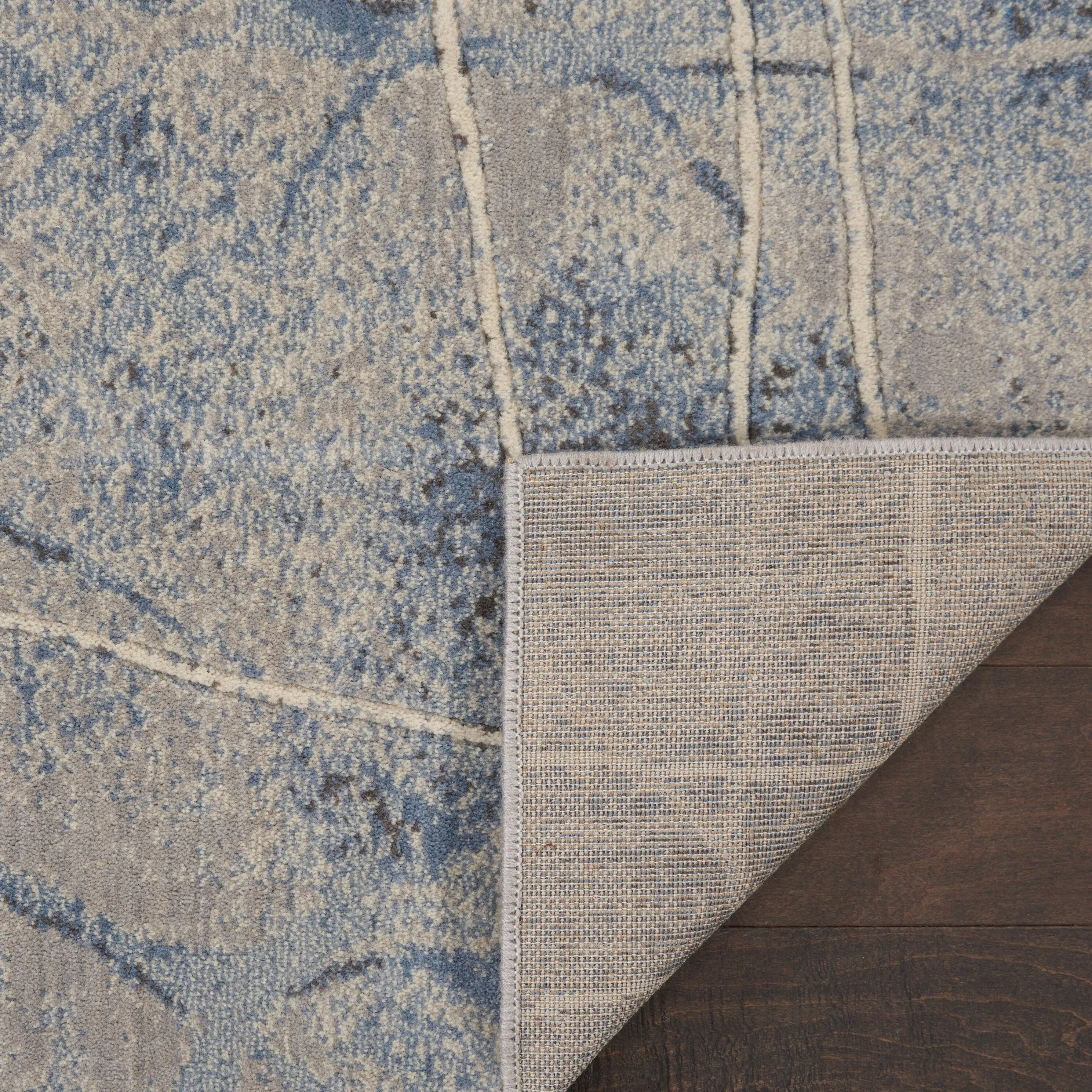 Nourison Susan Contemporary Floral Indoor only Area Rug.