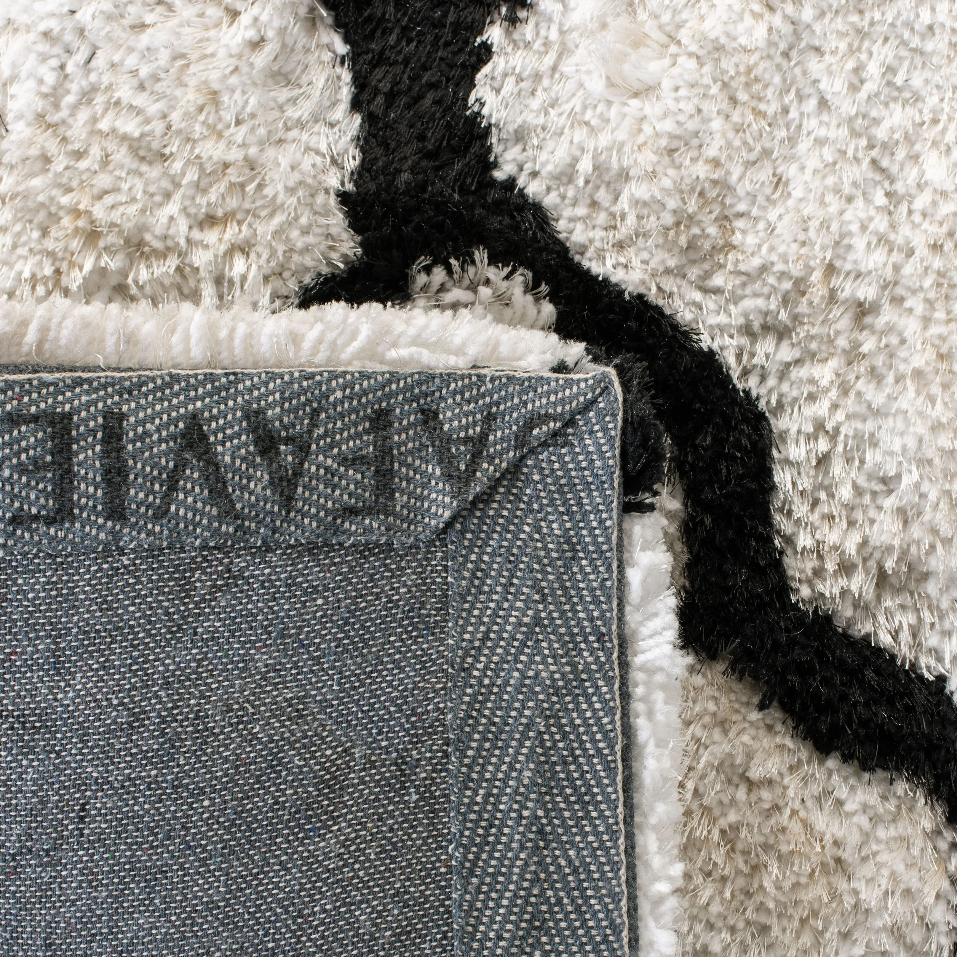 SAFAVIEH Handmade Barcelona Shag Kiyo Polyester Rug