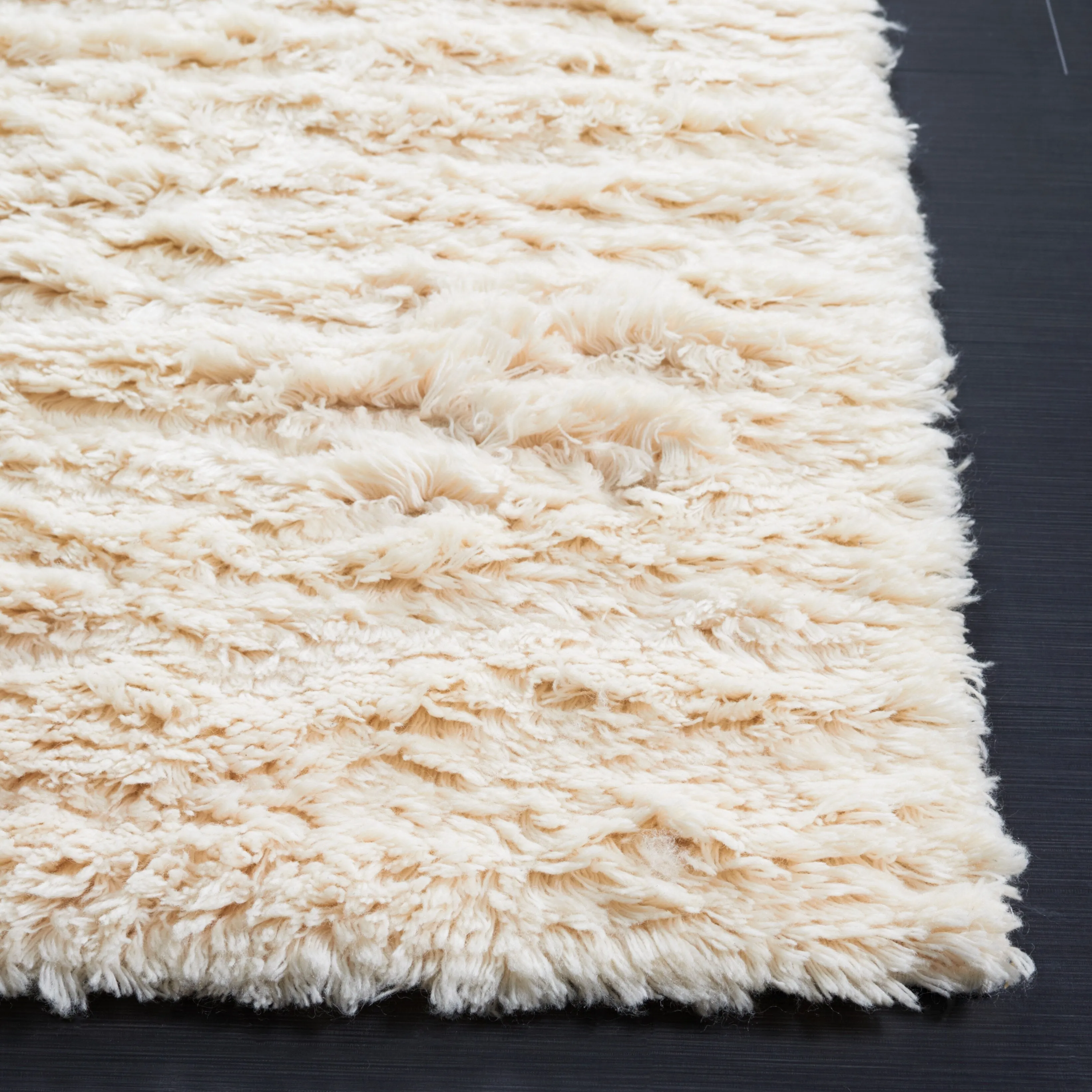 SAFAVIEH Handmade Casablanca Shag Edle Solid Wool Rug