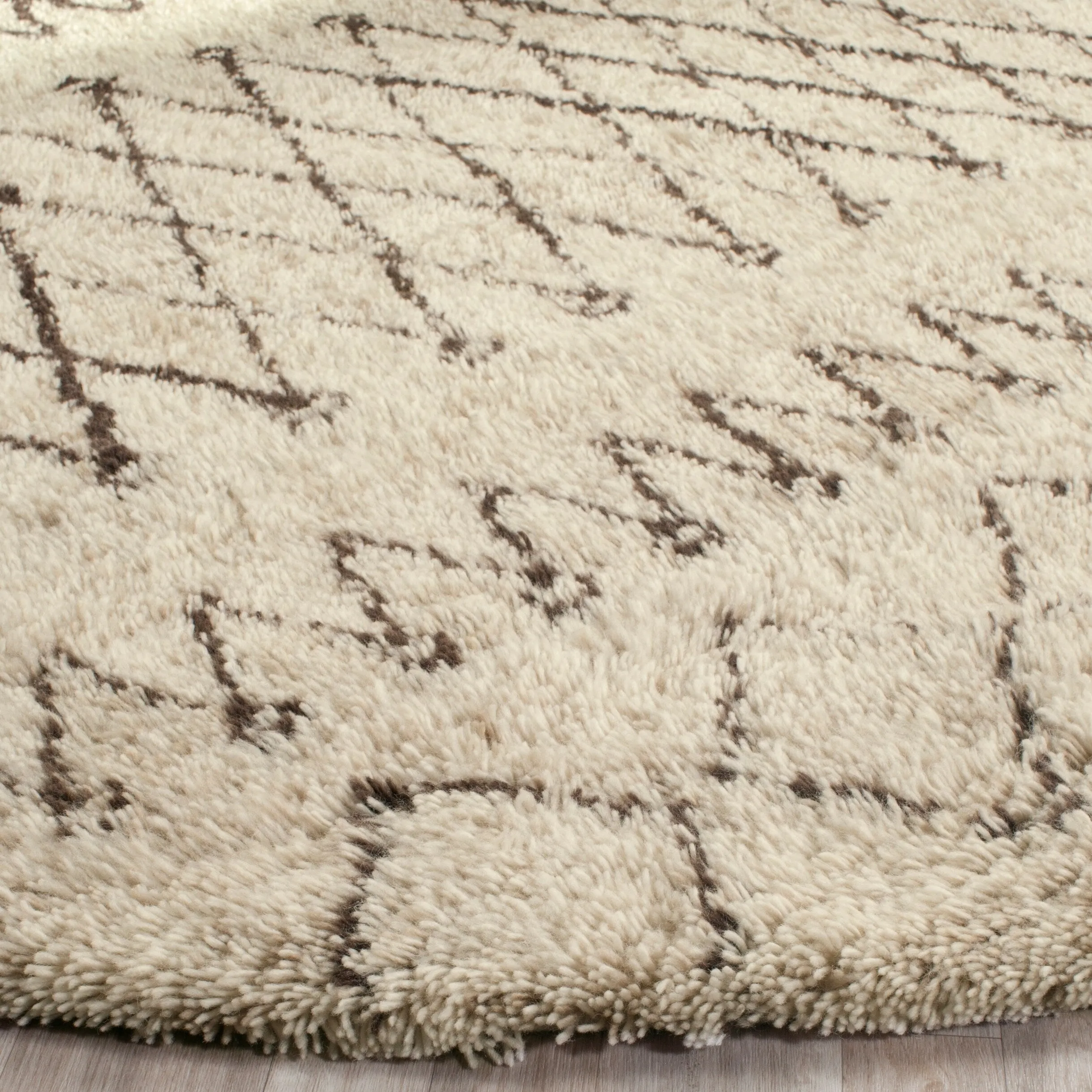 SAFAVIEH Handmade Casablanca Shag Intisar Tribal Wool 1.25-inch Thick