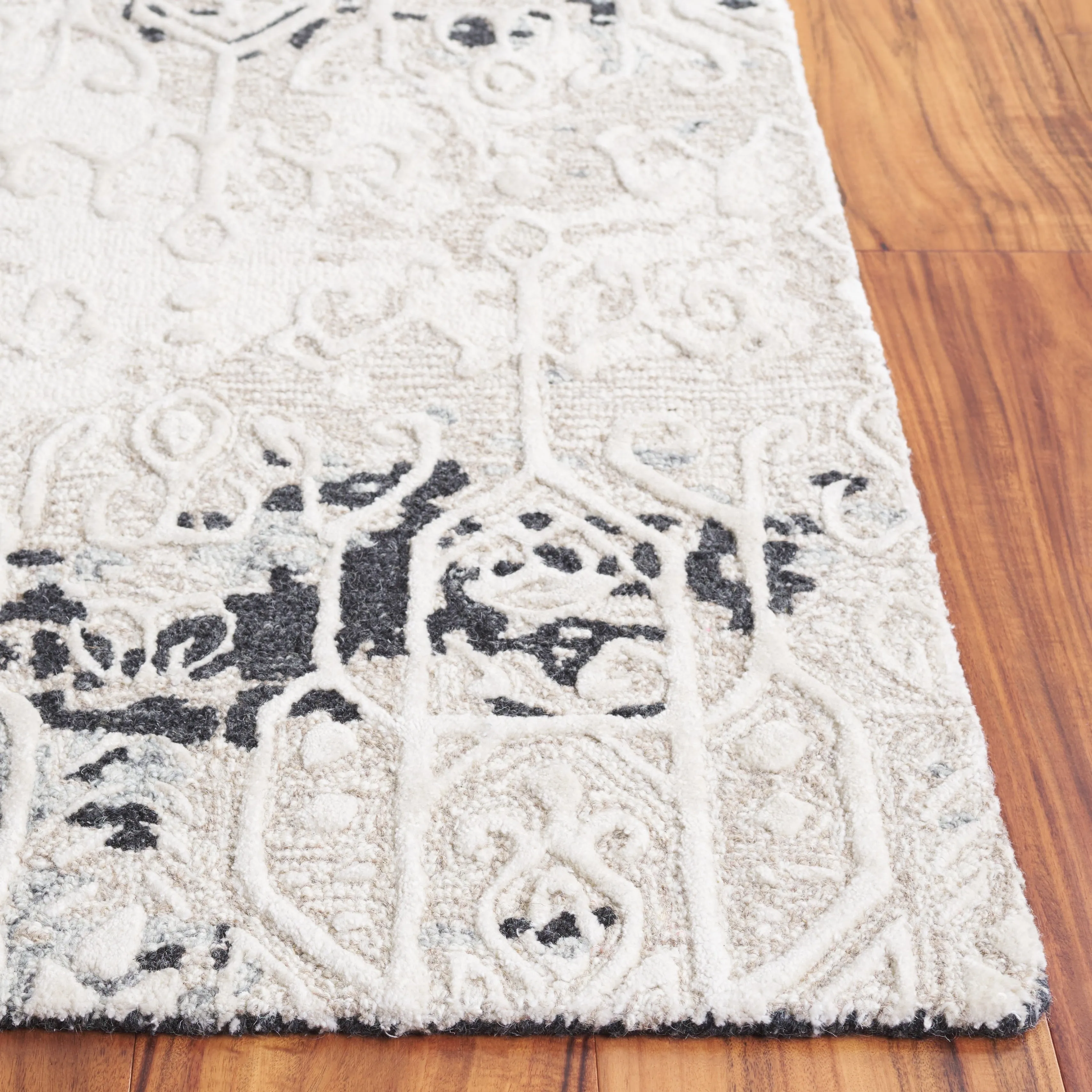 SAFAVIEH Handmade Ebony Marusa Modern & Contemporary Wool Rug