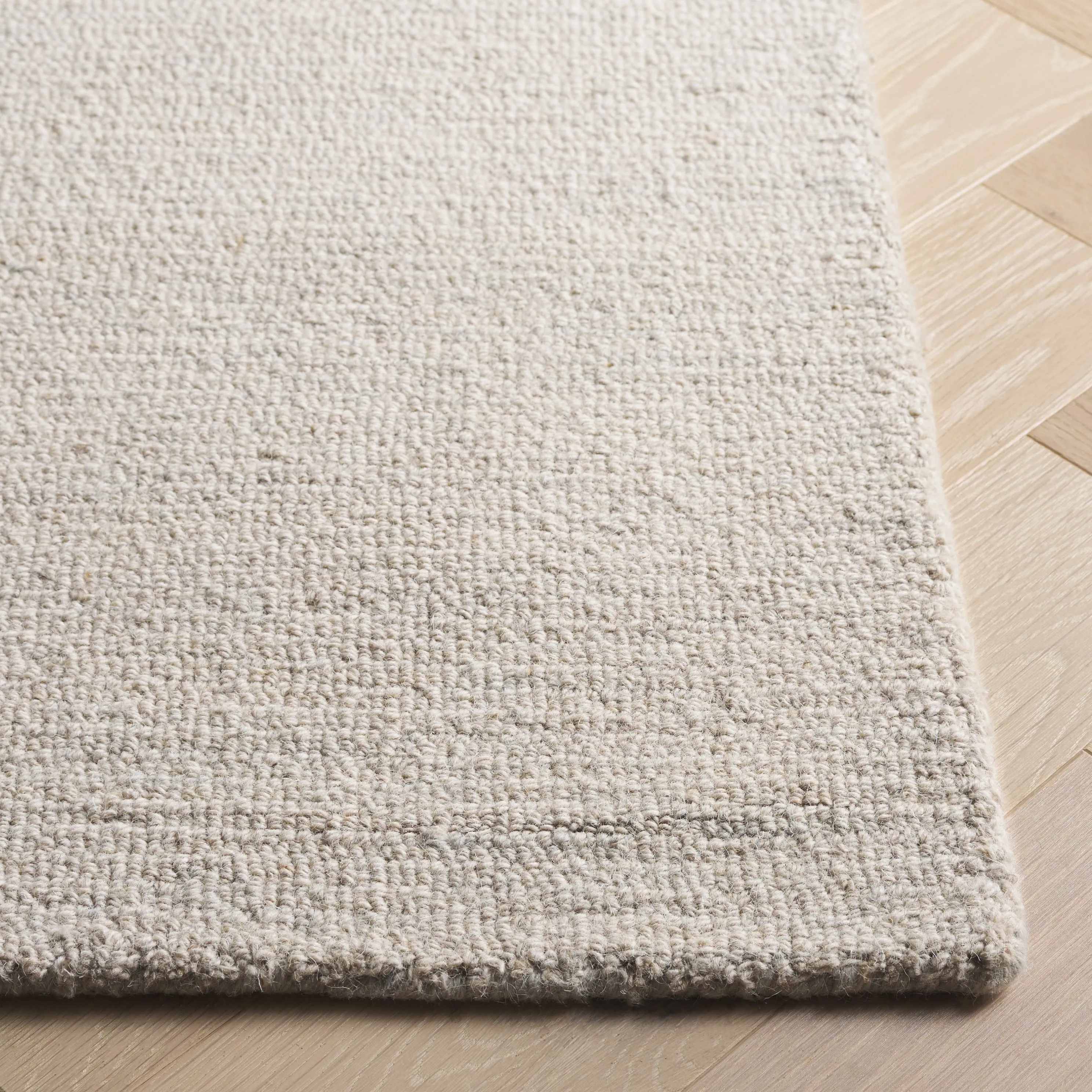 SAFAVIEH Handmade Ebony Rimah Modern & Contemporary Wool Rug