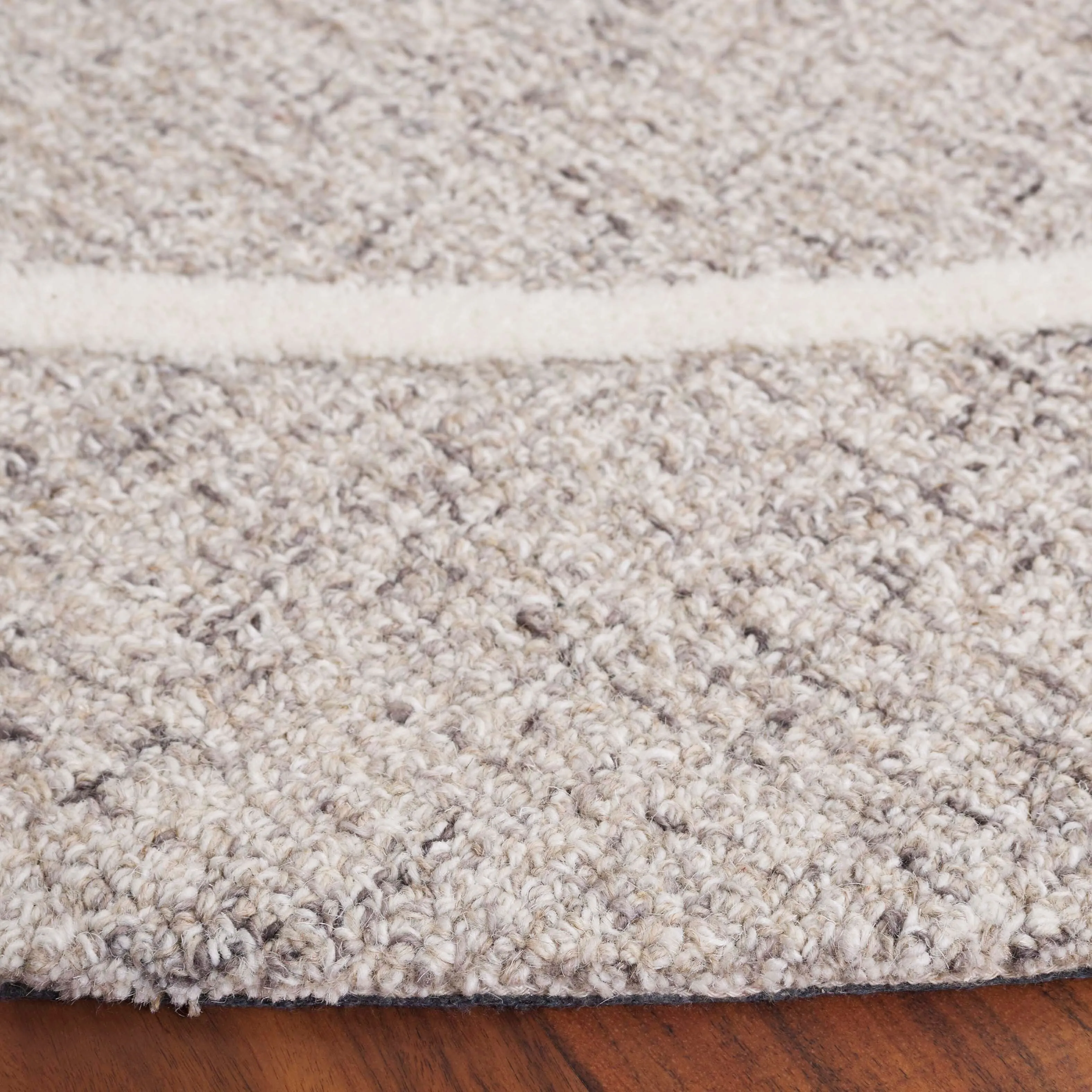 SAFAVIEH Handmade Ebony Steinvor Modern & Contemporary Wool Rug