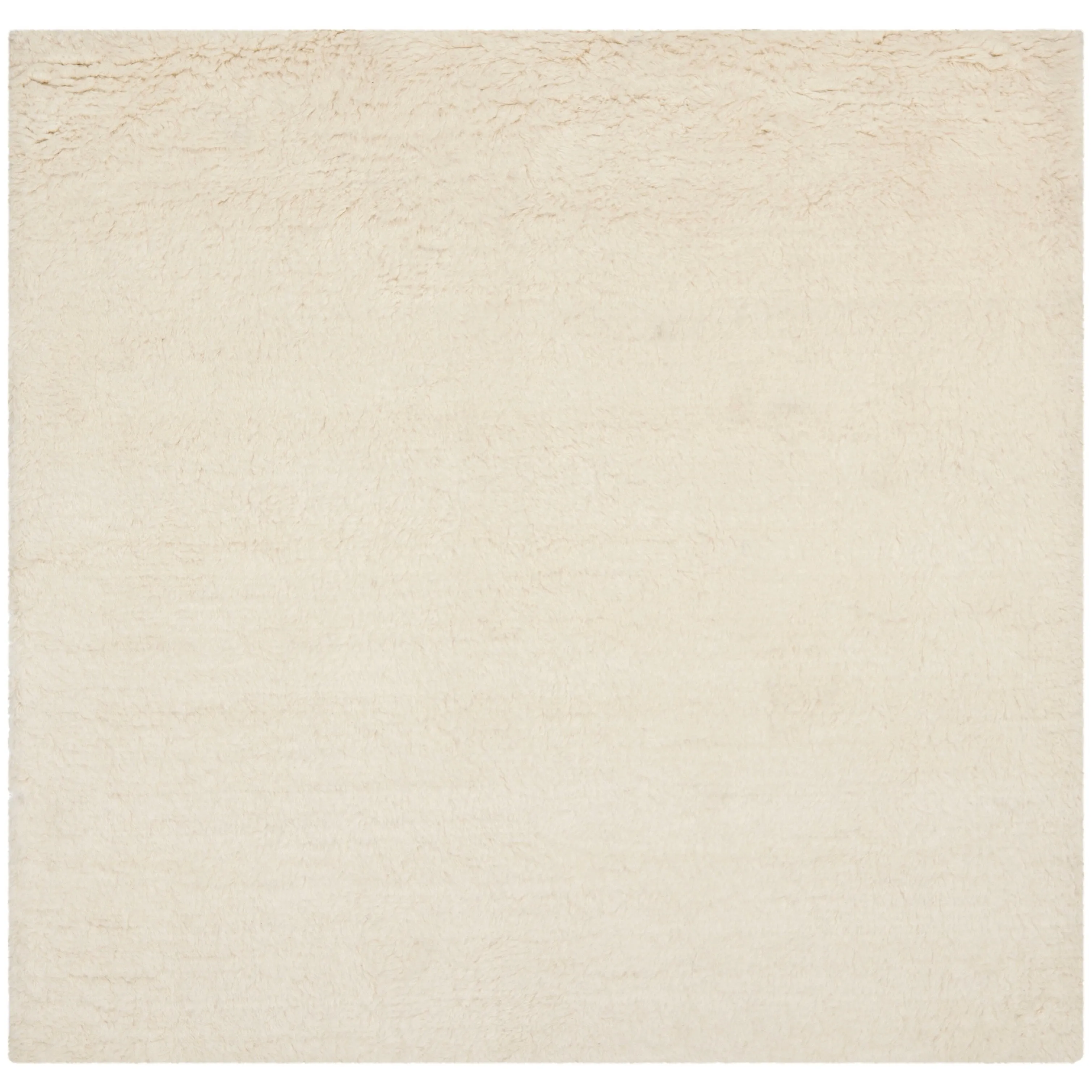 SAFAVIEH Handmade Flokati Jannine Shag Solid Wool Rug
