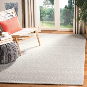 SAFAVIEH. Handmade Micro-Loop Fedosia Wool Rug