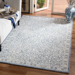SAFAVIEH. Handmade Micro-Loop Marushka Wool Rug