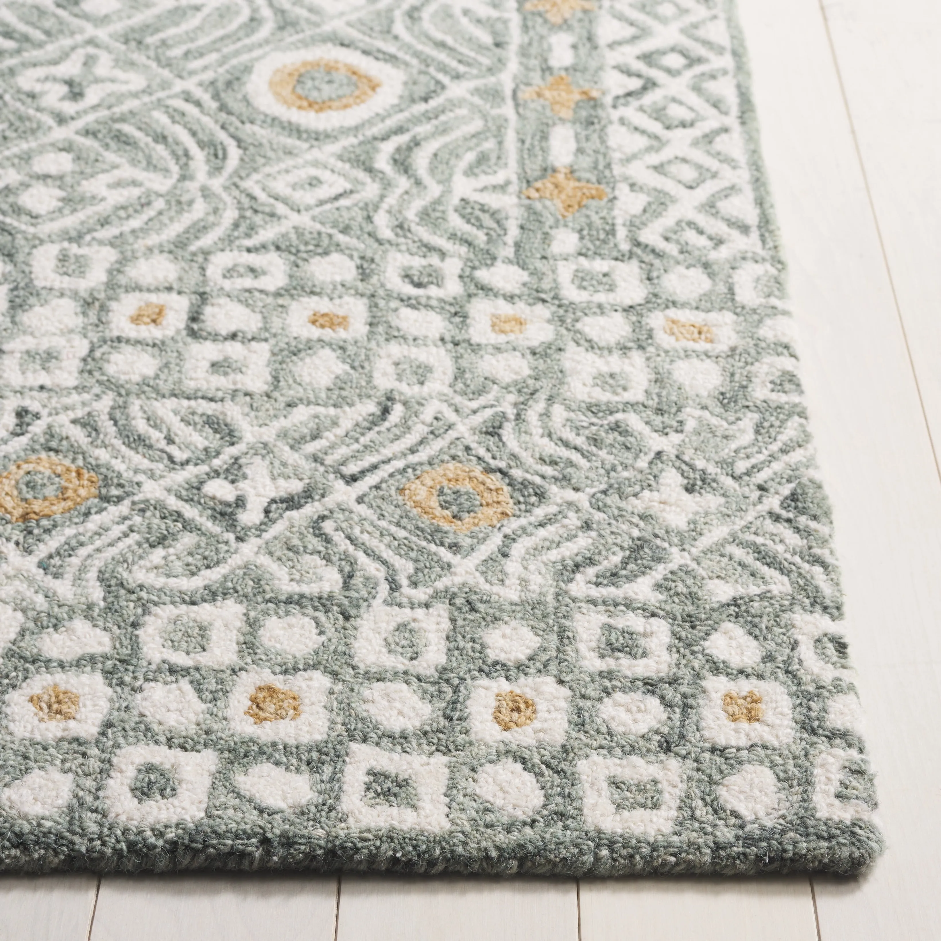 SAFAVIEH Handmade Micro-Loop Reglind Wool Rug