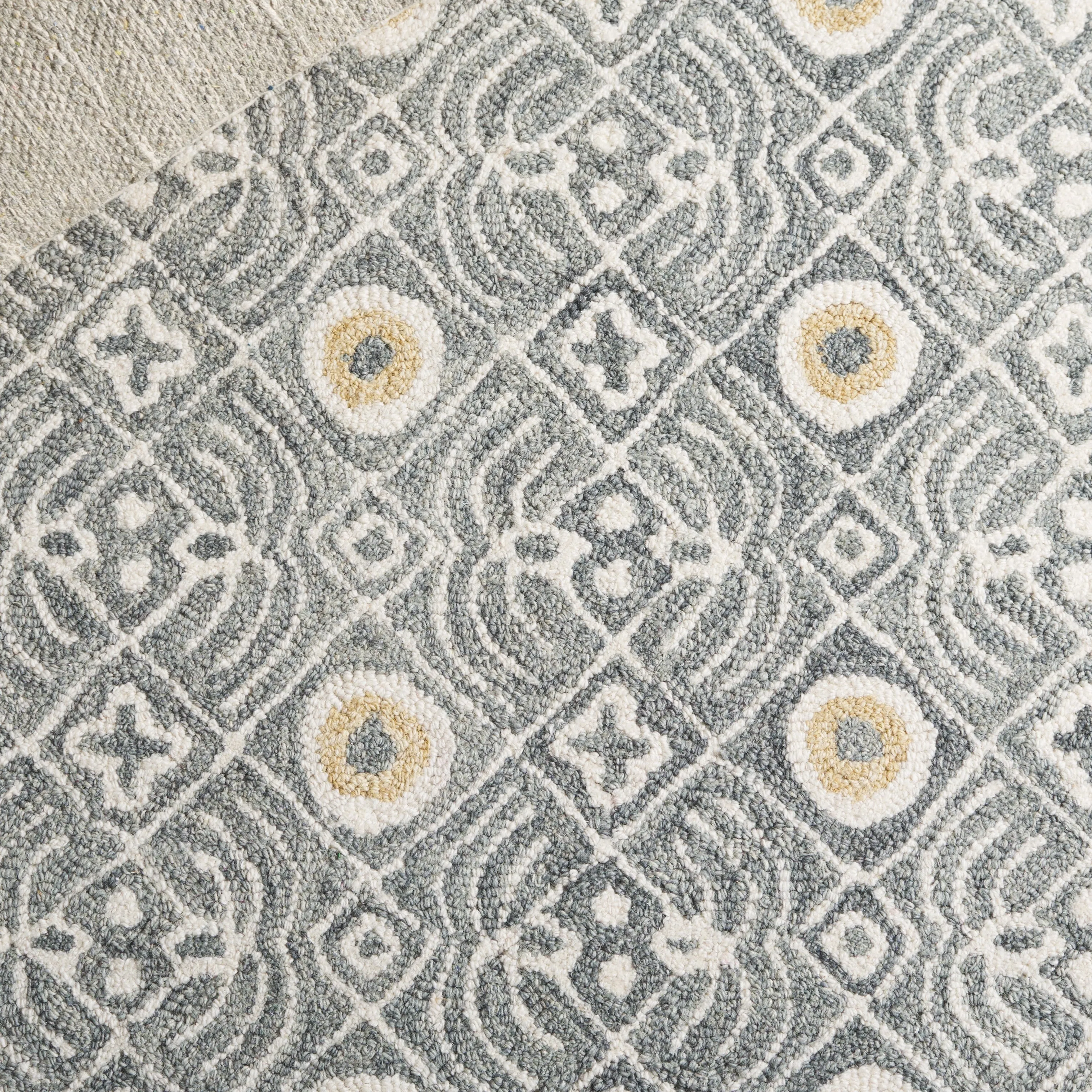 SAFAVIEH Handmade Micro-Loop Reglind Wool Rug