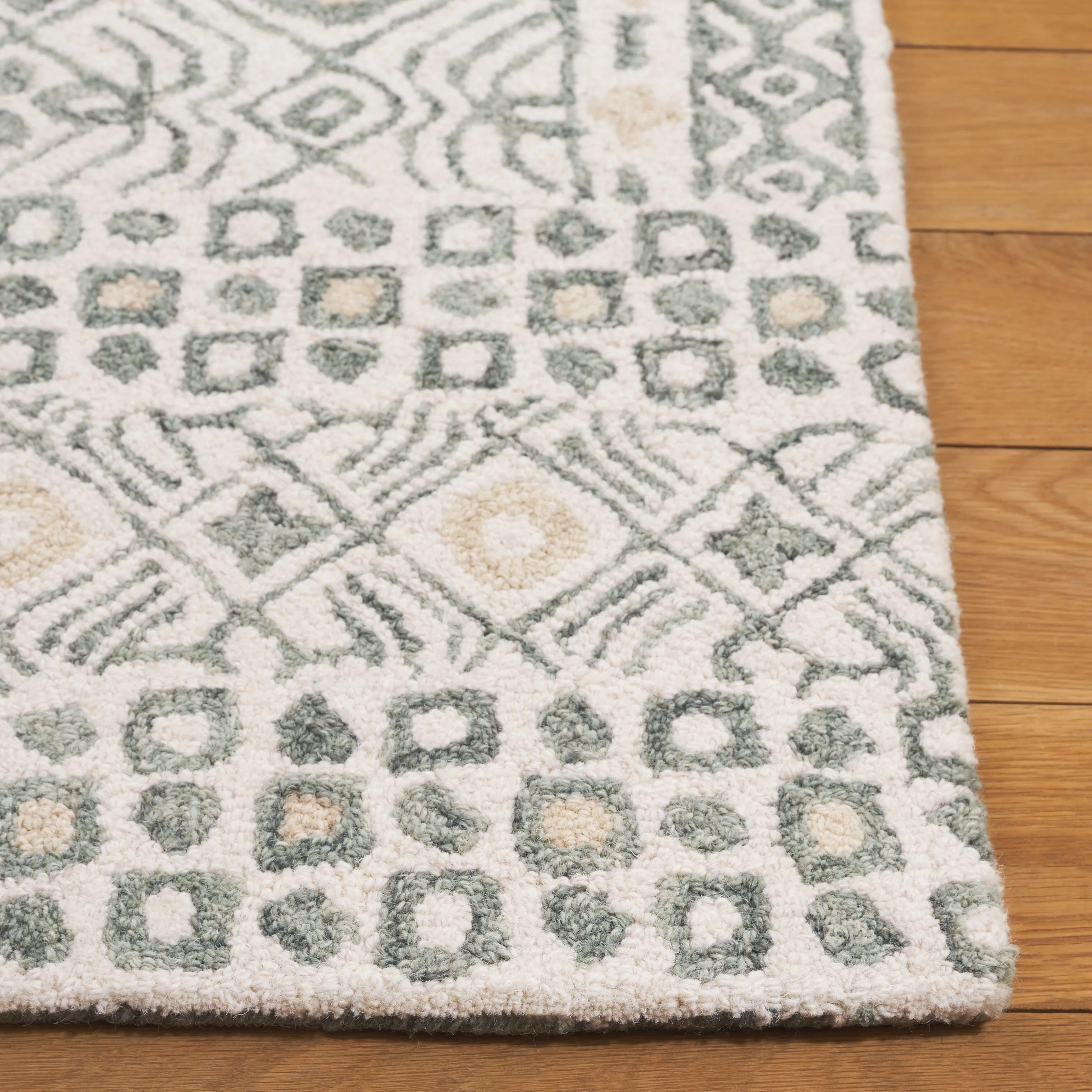 SAFAVIEH Handmade Micro-Loop Reglind Wool Rug