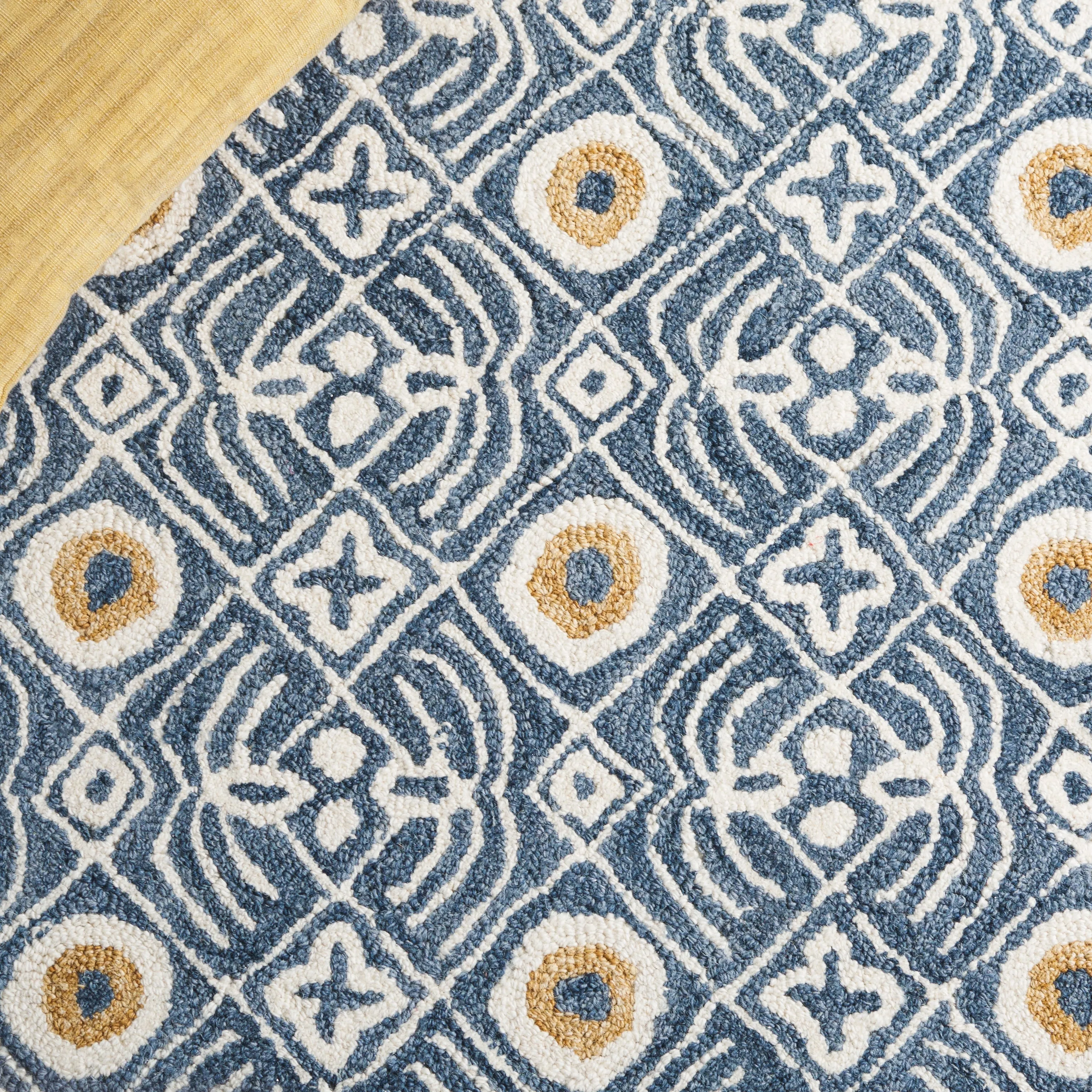SAFAVIEH Handmade Micro-Loop Reglind Wool Rug