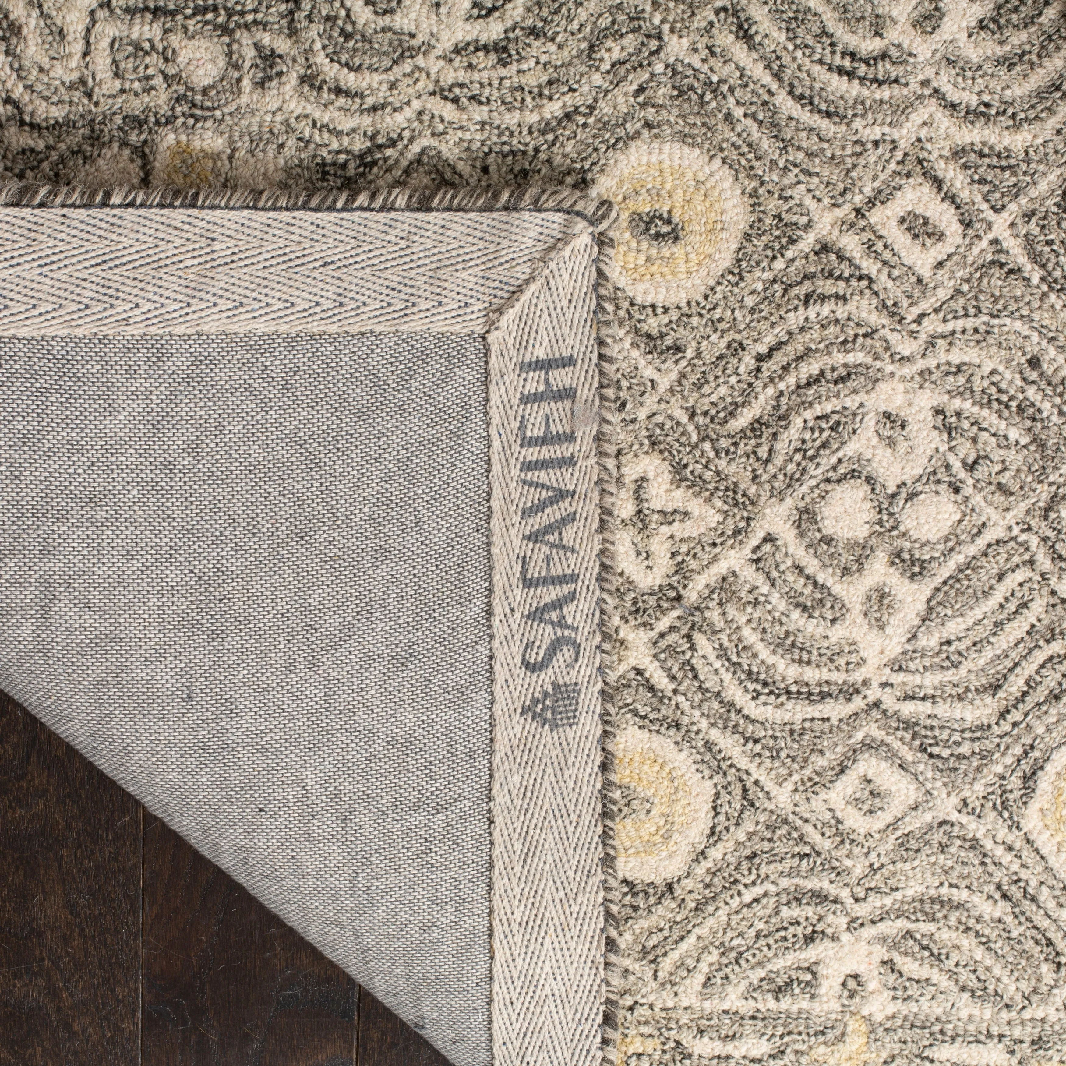 SAFAVIEH Handmade Micro-Loop Reglind Wool Rug