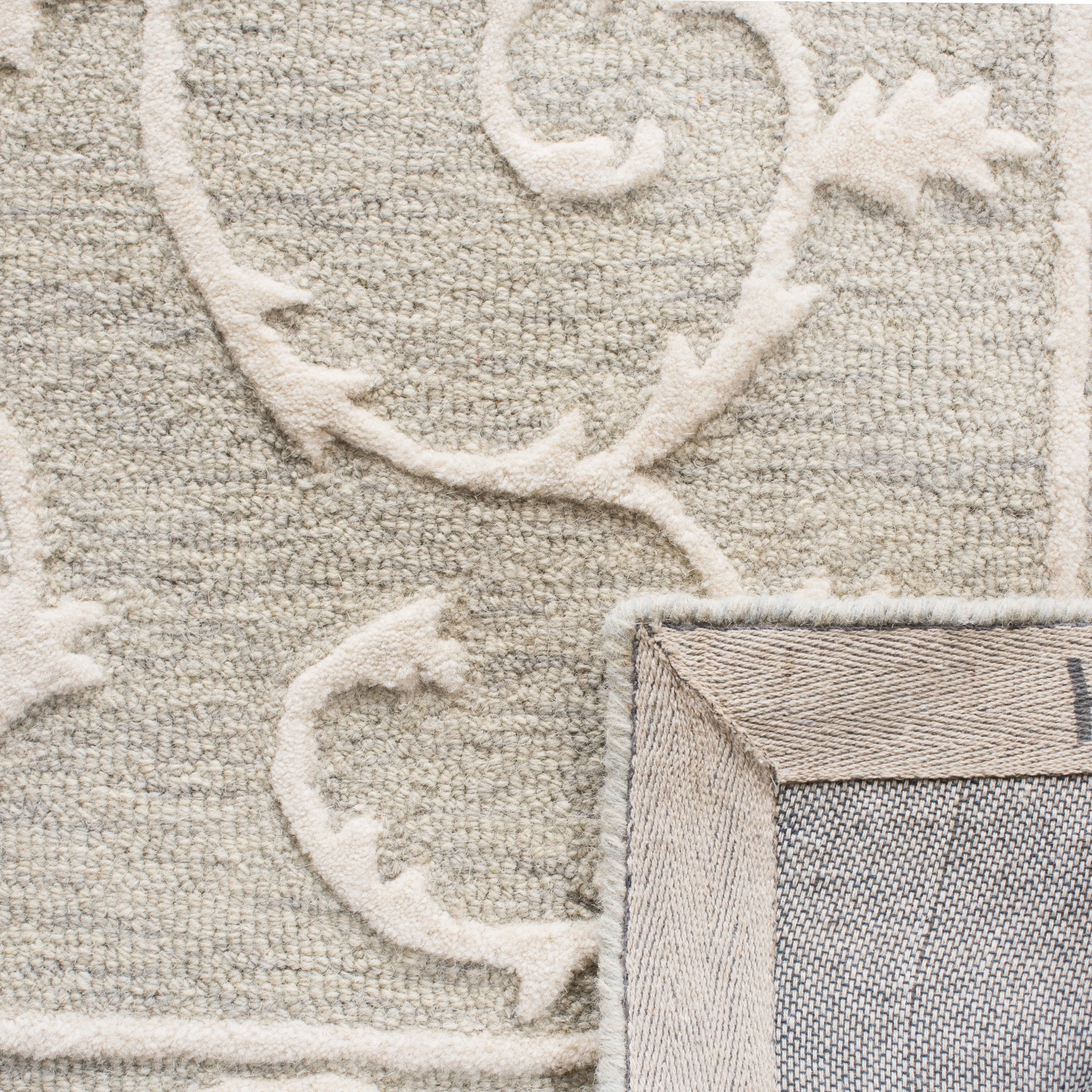 SAFAVIEH Handmade Micro-Loop Tomke Wool Rug