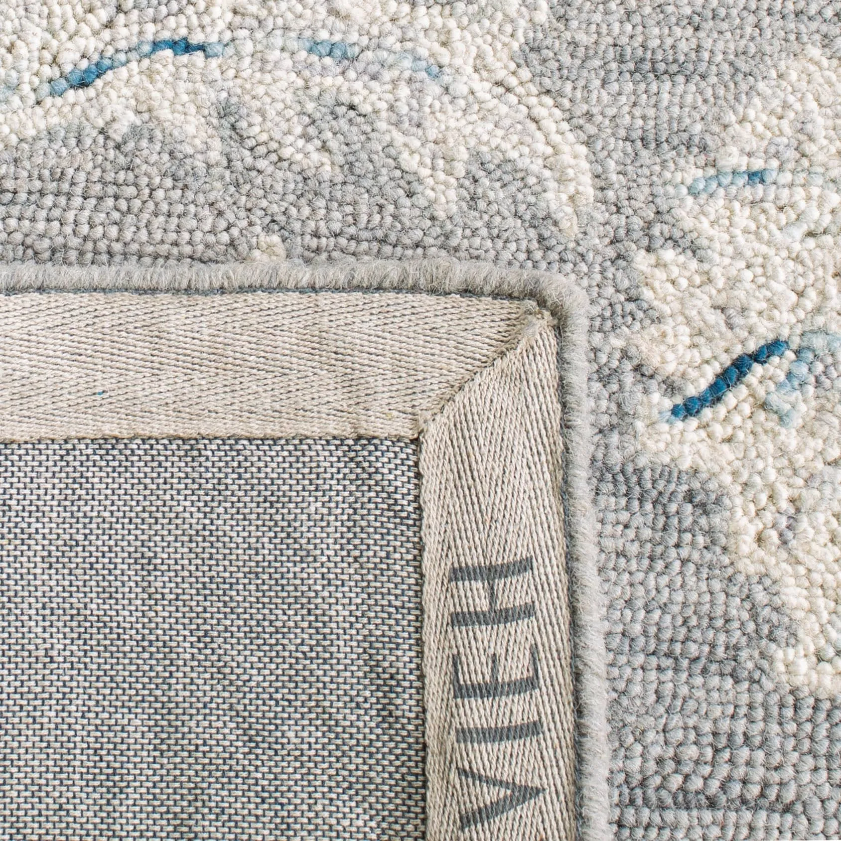 SAFAVIEH Handmade Micro-Loop Utta Wool Rug