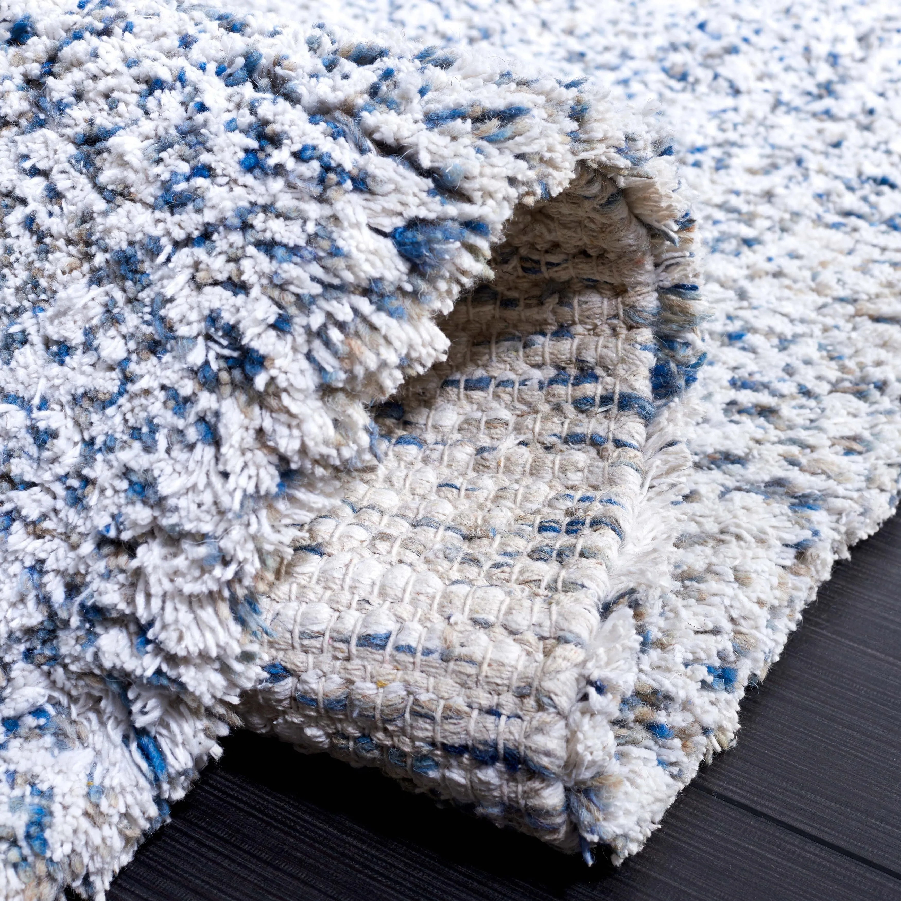 SAFAVIEH Handmade Ortanta Shag Bibeta Wool Rug