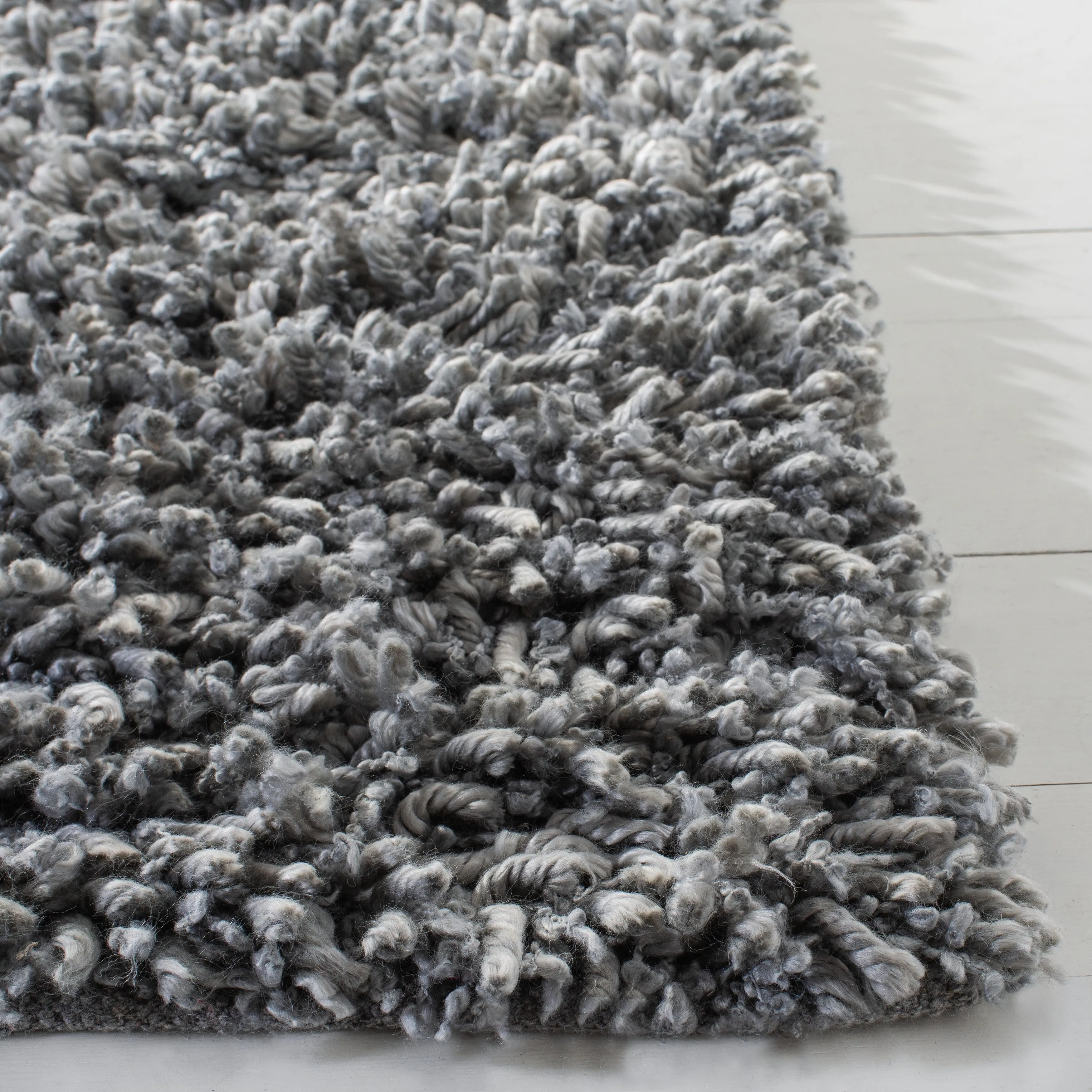 SAFAVIEH Handmade Sheep Shag Malti Solid Area Rug