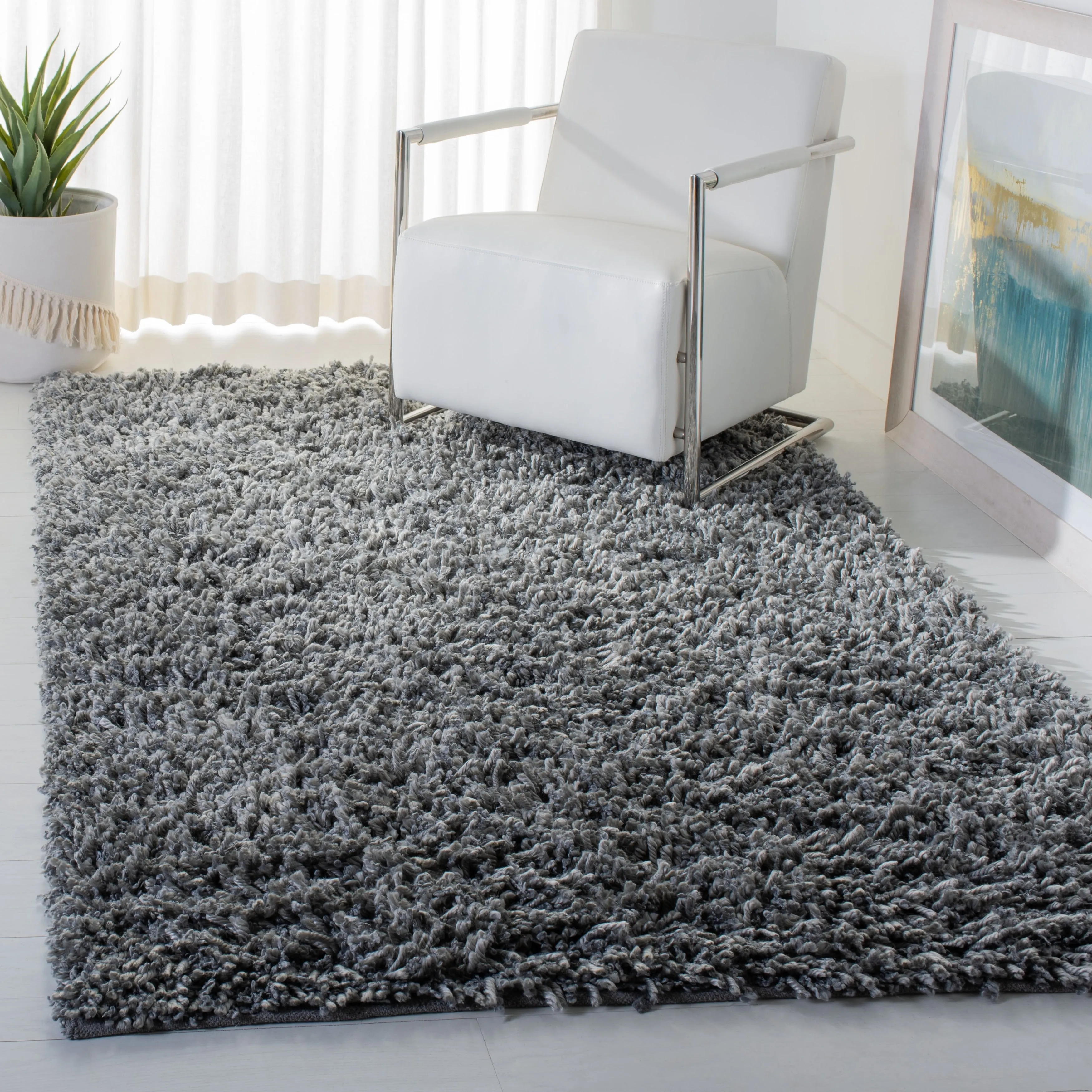 SAFAVIEH Handmade Sheep Shag Malti Solid Area Rug