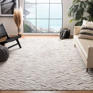SAFAVIEH Handmade Studio Leather Tanesha Natural Hide Leather Rug
