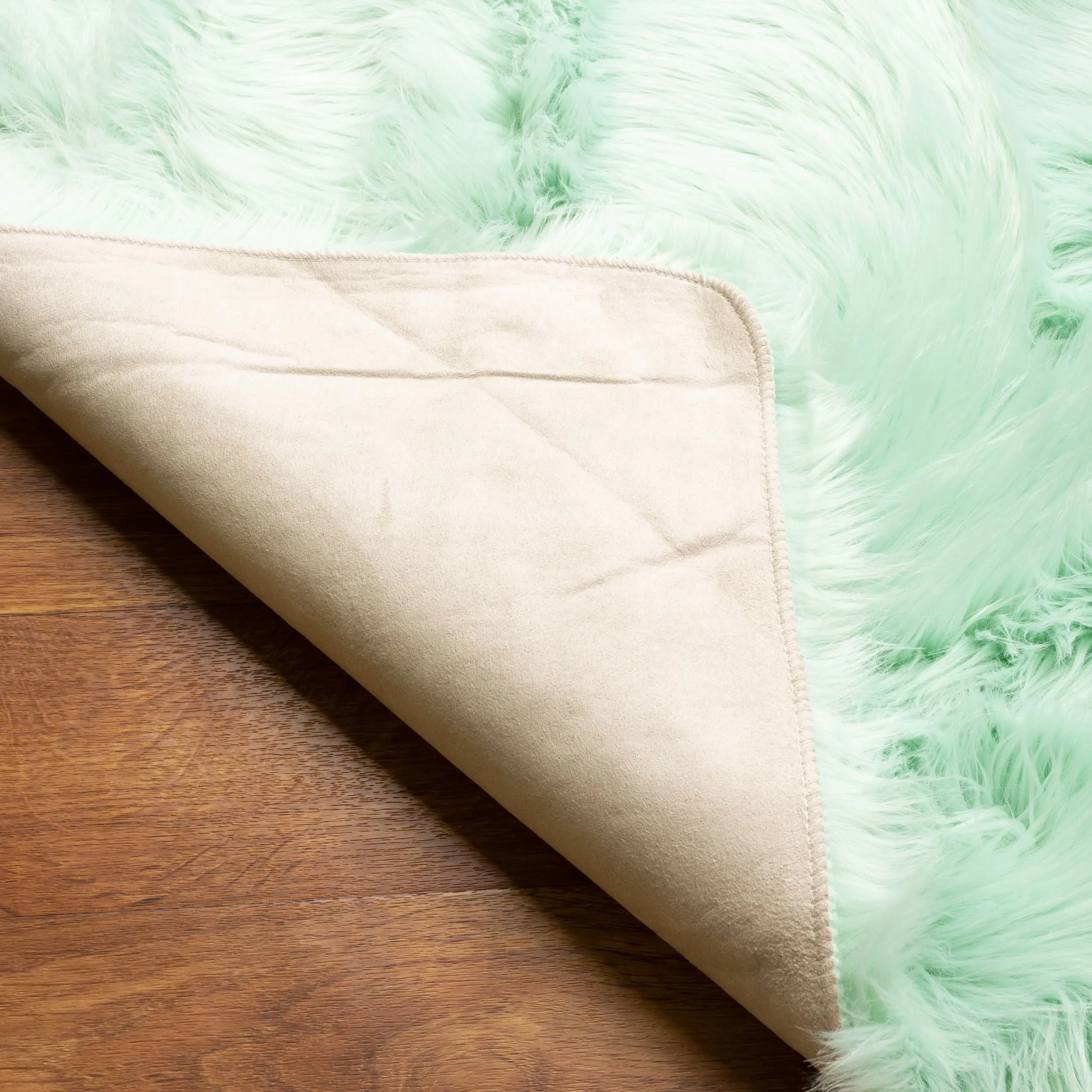 Silver Orchid Parrott Faux Fur Sheepskin Area Rug